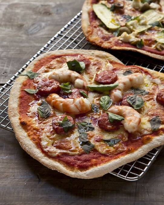 For a quick version of this chorizo and prawn pizza, use a store-bought pizza base ... <a href="http://www.goodfood.com.au/good-food/cook/recipe/chorizo-and-prawn-pizza-20130318-2g9ut.html"><b>(recipe here).</b></a> Photo: Marina Oliphant