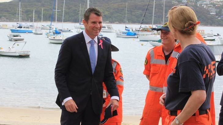 "Storms can hit anytime, anywhere:" NSW Premier Mike Baird joins the NSW SES to warn the state about the coming storm season.  Photo: Peter Rae