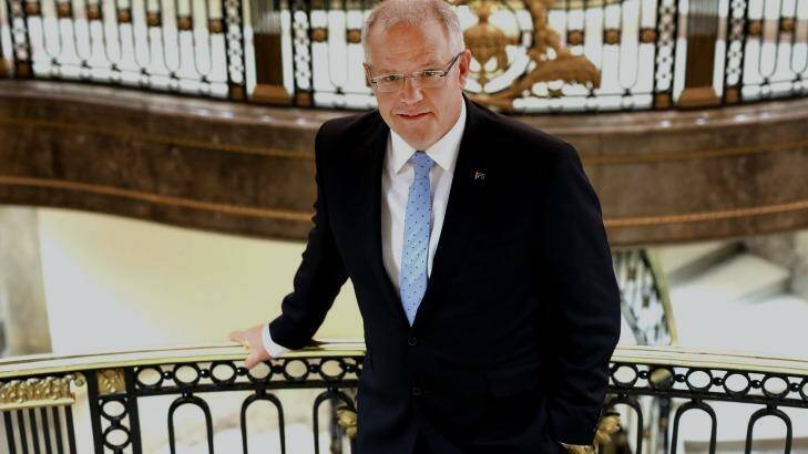 Treasurer Scott Morrison, pictured in London this week, says the government is making progress in reining in Australia's debt. Photo: Chris Ratcliffe