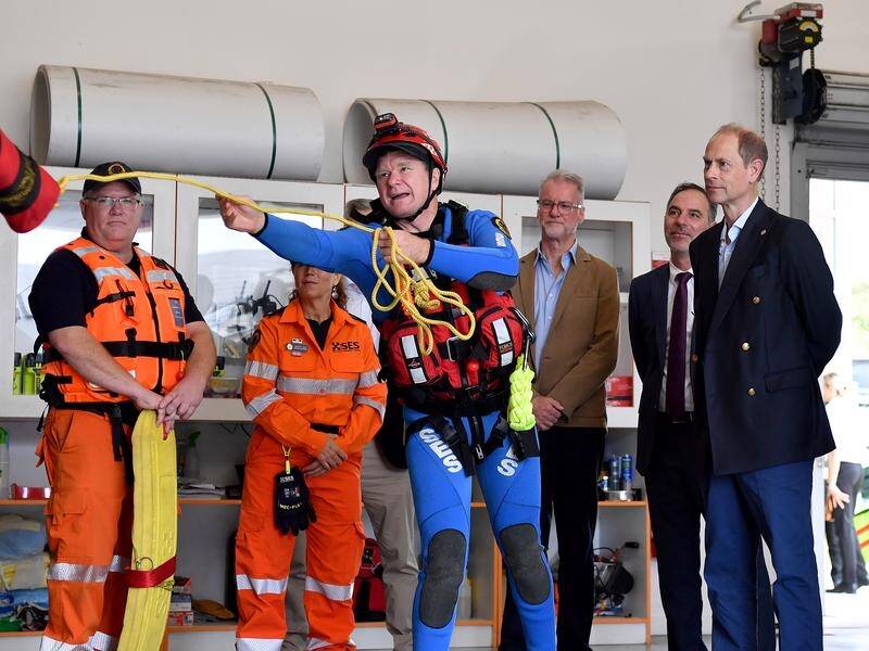 The Duke of Edinburgh (far right) has been put to the test while meeting SES volunteers. (Bianca De Marchi/AAP PHOTOS)