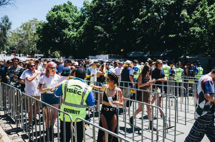Spilt Milk music festival at Commonwealth Park. Security check IDs at the entry.