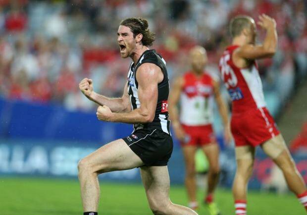 Collingwood's Tyson Goldsack celebrates a goal in the win over Sydney at ANZ Stadium. Photo: Anthony Johnson