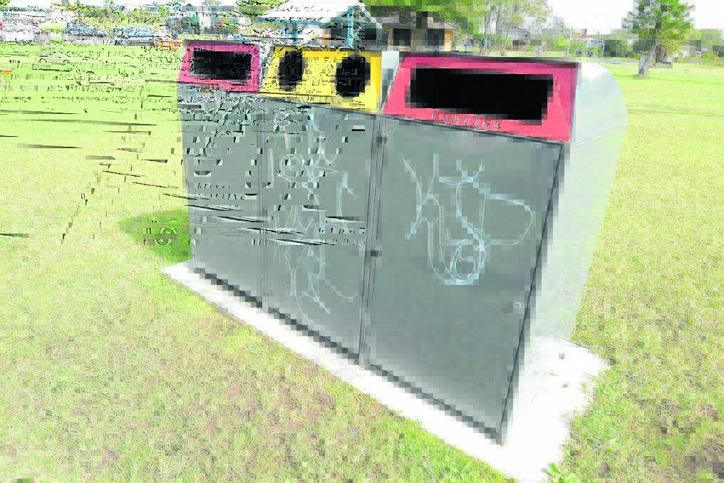 New bins at the Old Bar park have been covered in graffiti.