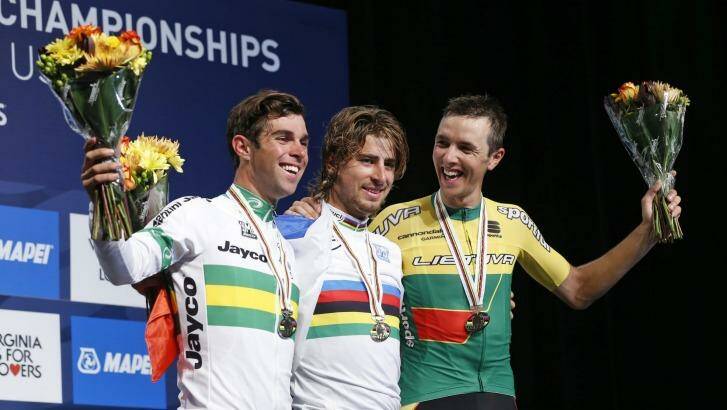 Podium pals: Peter Sagan, centre, of Slovakia, winner of the road world championship, celebrates with runner-up Michael Matthews, left, and third-placed Ramunas Navardauskas, of Lithuania, in Richmond, Virginia. Photo: Steve Helber