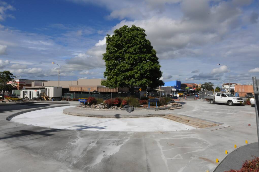 The Pulteney Street roundabout, pictured under construction in 2013, is an example of where Greater Taree City Council uses concrete to provide a more solid foundation for turning traffic. 