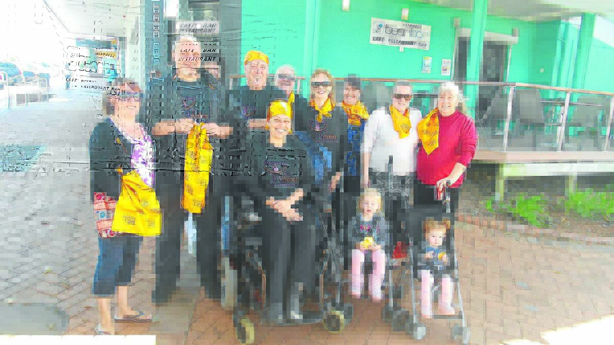 Into the light: Taree's walkers included (back) from Recovery in Action (RIA), Helen Chaplin, Scott Gourlay, Linda Lee, Mark Matthews, Debra Hamill, Janine Learmonth, from Carer Assist Mydie Keegan, and community members Emma Dengate and Kate Brown; front, from Recovery in Action Juanita Vernon, and Emma Dengate's daughters, Kaeli and Lexie Gentle.
