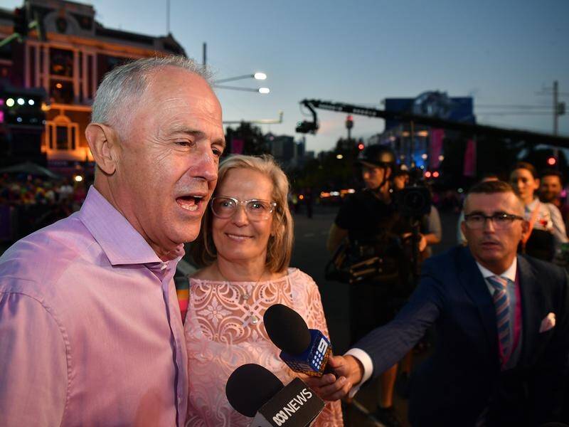 Prime Minister Malcolm Turnbull and his wife Lucy celebrating the 40th Mardi Gras parade.