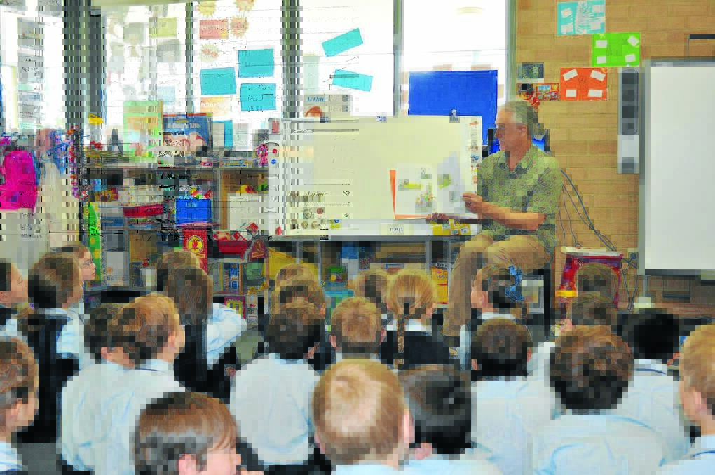 Author, illustrator and Manning resident, Stephen Michael King reads to young students at Manning Valley Anglican College and then talked them through his illustration process.