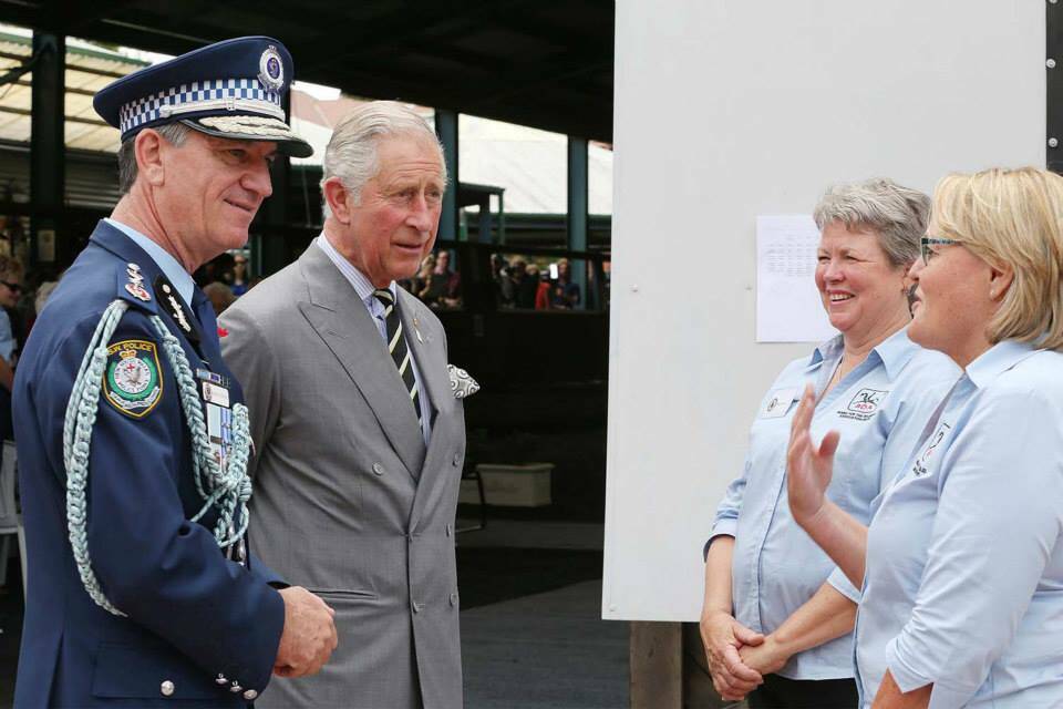 NSW Police Commissioner Andrew Scipione, the Prince of Wales Charles, converse with state president of RDA and Manning Great Lakes RDA coach Marg Lewis.