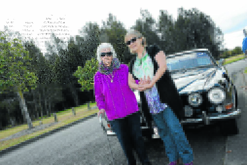 Right: Arriving in style, Rose Tufrey and granddaughter Deborah Hogan with Keith Smith's 1974 Mark 10 Jaguar.