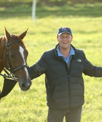 Horse trainer Ed Dunlop with Melbourne Cup veteran Red Cadeaux and second favourite Trip To Paris at Werribee Racecourse. Photo: Pat Scala