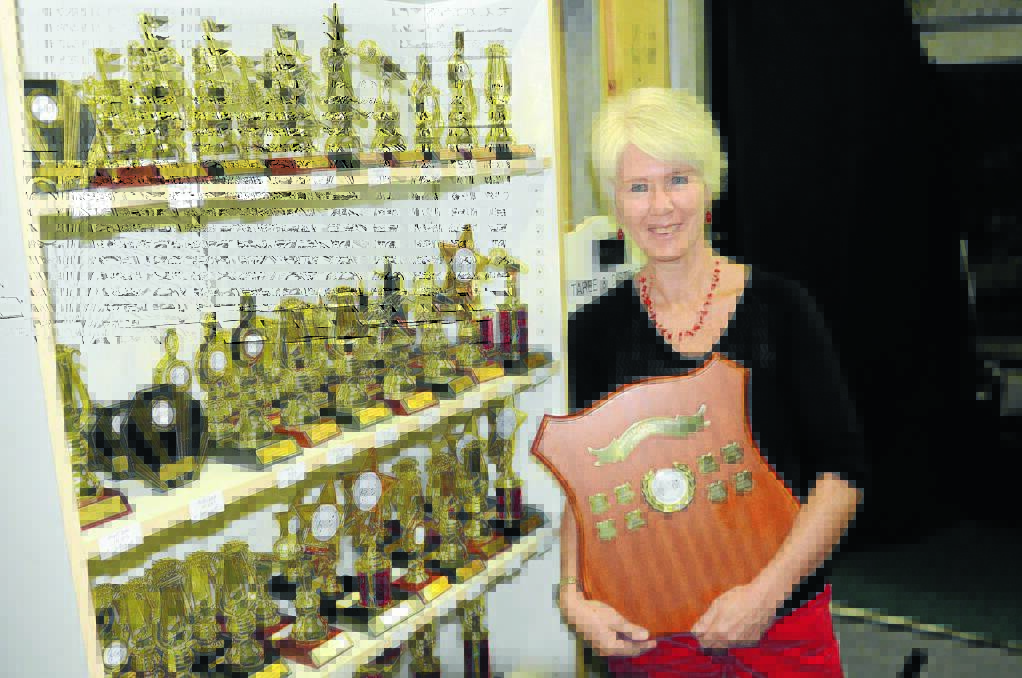 Gleaming gold trophies await the outcome of the vocal section of the 47th annual Taree and District Eisteddfod. Vocal co-ordinator Deirdre Sutherland is hoping the Manning Valley community will rally to attend the championship performance on Saturday night.