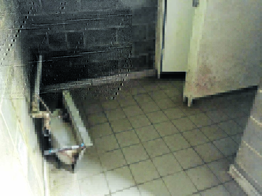 Health hazard and an eye sore: The sink in the men's toilet block has been wrenched off the wall.