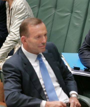 Prime Minister Tony Abbott's pledge is in contrast to Treasurer Joe Hockey's refusal to put a timeframe on a return to surplus. Photo: Alex Ellinghausen