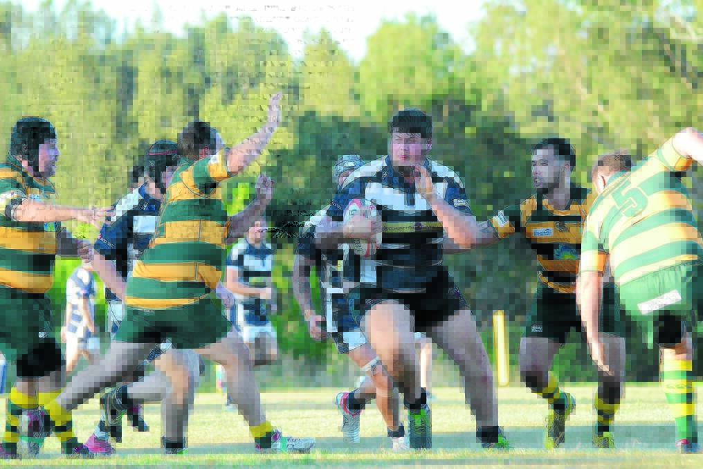 Ratz second rower Blake Howard powers through the Forster-Tuncurry line in the Lower North Coast Rugby clash at Ratz Park.
