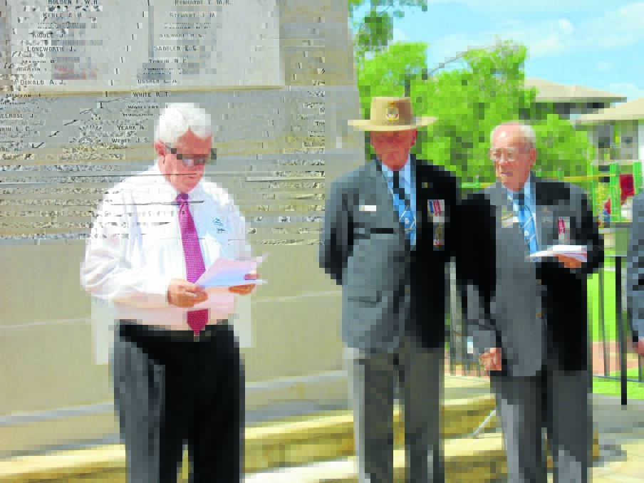 Mayor Paul Hogan, RSL senior vice president Darcy Elbourne and committee member Barrie Thompson at the rededication service.