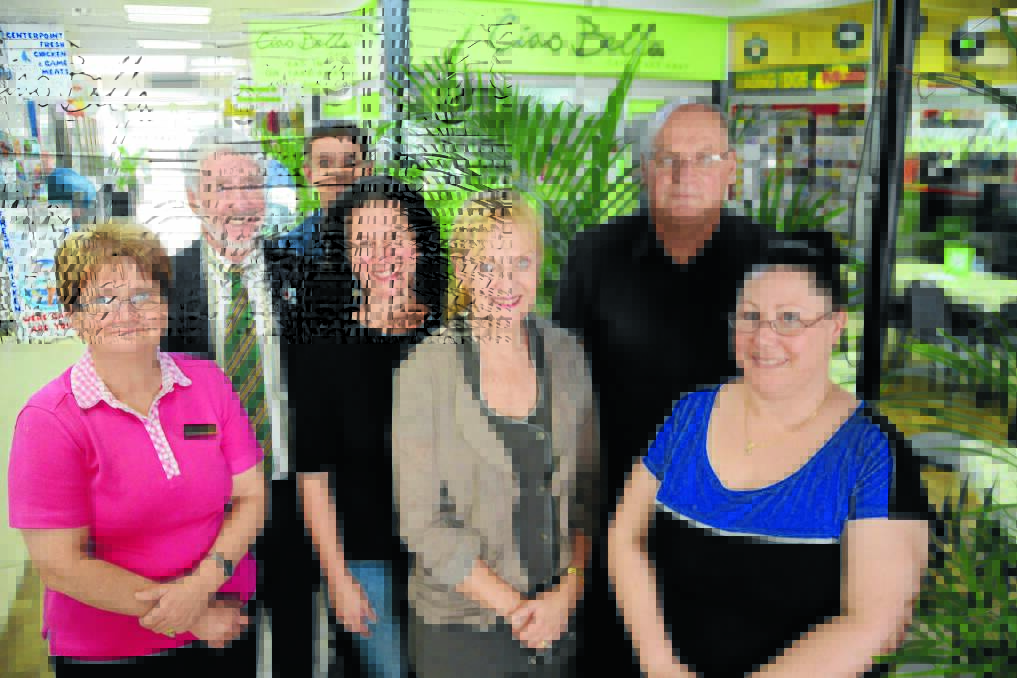 Open invitation to breakfast meeting: Centerpoint Arcade landlord, Maurie Stack (second from left), pictured with arcade tenants and employees, Elaine Dutch, Jason Bowen, Angela Hardes, Noelene Easton, Trevor Savell and Sarah Hedger, invite prospective retail tenants to listen to David Engwicht’s vision.