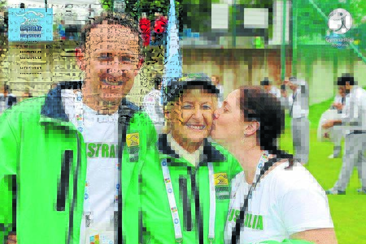 An inspiration: Justin Hayes, Doreen Rayward and Sarah Hayes. Doreen held the Australia flag at the World Gymnaestrada, an honour, according to coach Sarah Hayes she greatly deserved.