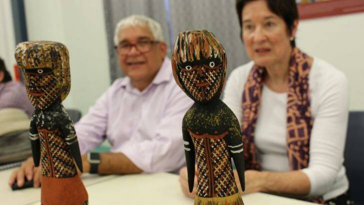 Royal Commissioners Mick Gooda and Margaret White with Tiwi totemic statues. Photo: Hasnah Harari