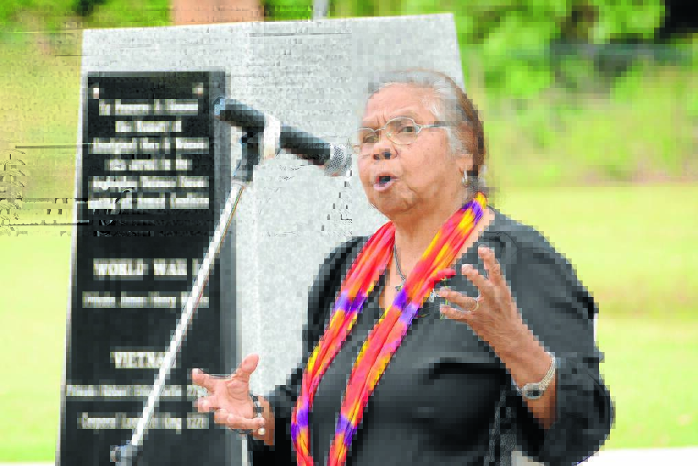 Aunty Alice Golding told the story of her father, World War I soldier James Henry Morris. His name is engraved on the plaque behind her at the Marrangbah Cottage Aboriginal Memorial.