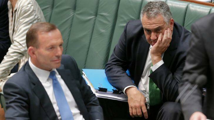 Prime Minister Tony Abbott's pledge is in contrast to Treasurer Joe Hockey's refusal to put a timeframe on a return to surplus. Photo: Alex Ellinghausen
