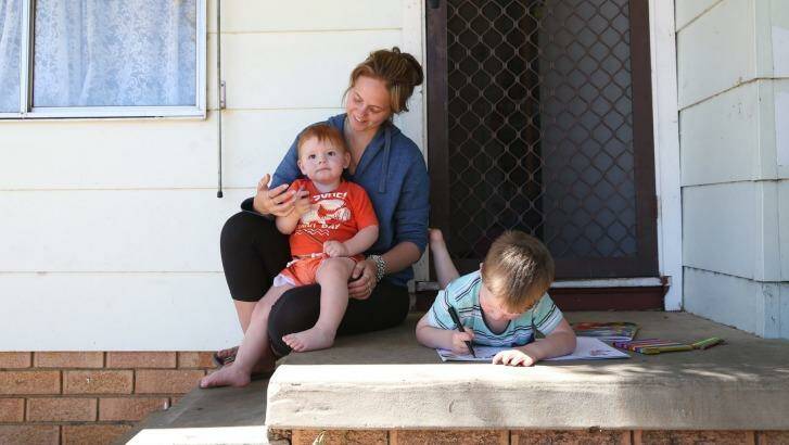 Single mother Jessica Russell with her two sons Ryan, almost three, and Andrew, one, at their home in St Clair. Photo: Louise Kennerley