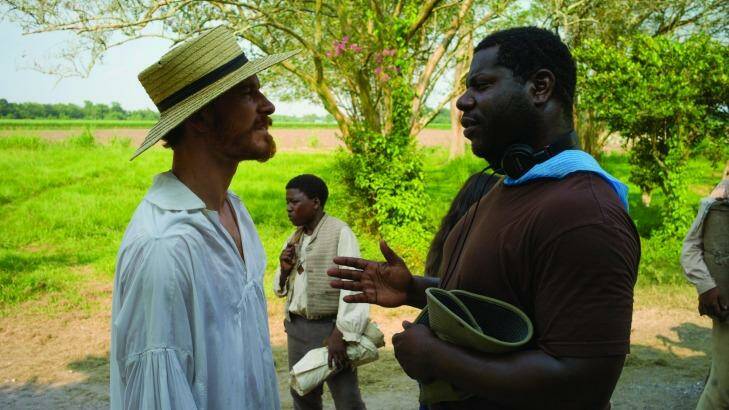 Michael Fassbender and director Steve McQueen on the set of <i>12 Years A Slave.</i> Photo: Francois Duhamel