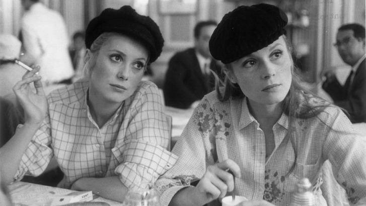 Vibrant French musical: Catherine Deneuve (left) and Francoise Dorleac in <i>The Young Girls of Rochefort</i>.