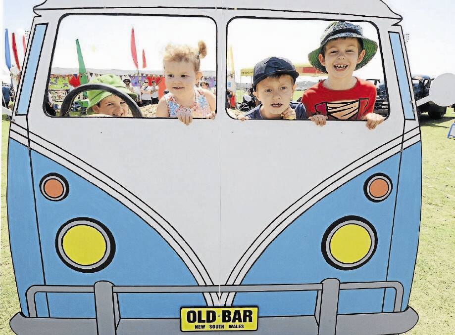 All aboard for the 2015 Old Bar Beach Festival: Deon and Beau Armstrong and Ryder and Ruby Edstein have a good time at the 2014 festival.