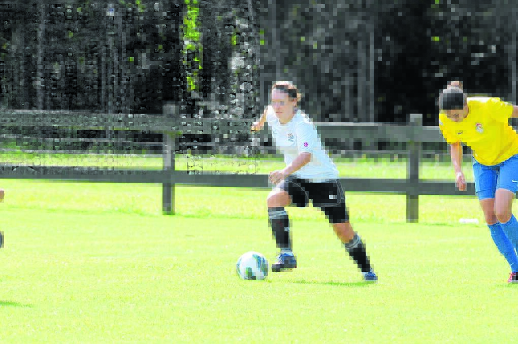 Amanda Armstrong playing for Football Mid North Coast in a premier league clash in 2013. FMNC meets Valentine on Sunday at Taree.