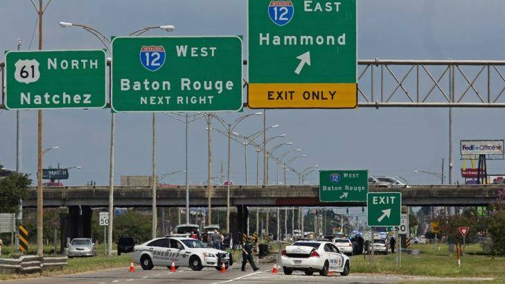 Baton Rouge police block Airline Highway after police were shot on Sunday. Photo: Max Becherer/AP