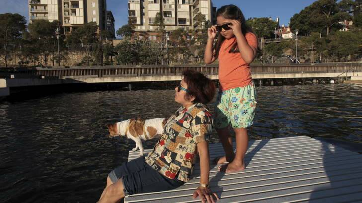 Pyrmont local Lyn, her granddaughter Janne, 7 and their dog Roxy cool down. Photo: Tamara Dean