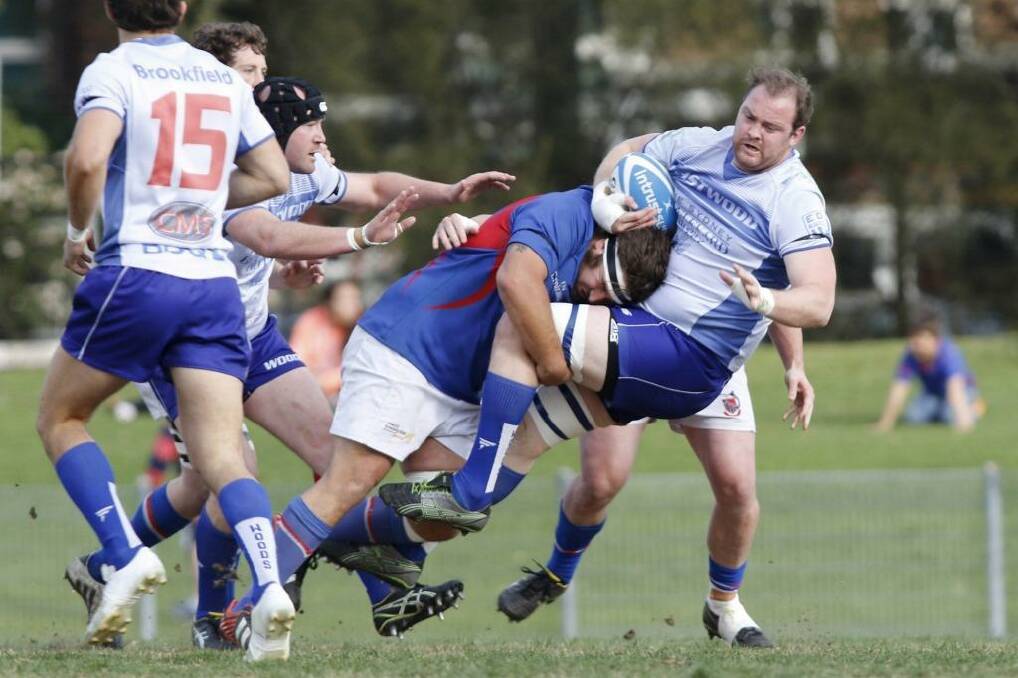 Caught: Eastwood’s Jarryd Barry is tackled during Saturday’s win. Photo: Quentin Jones