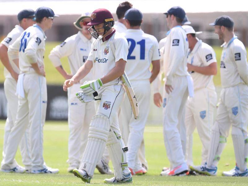 Queensland have stumbled on the opening morning of their Sheffield Shield match against NSW.