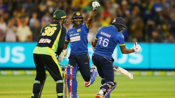 Big win: Seekkuge Prasanna of Sri Lanka reacts after Chamara Kapugedera hits the winning runs. Photo: Michael Dodge