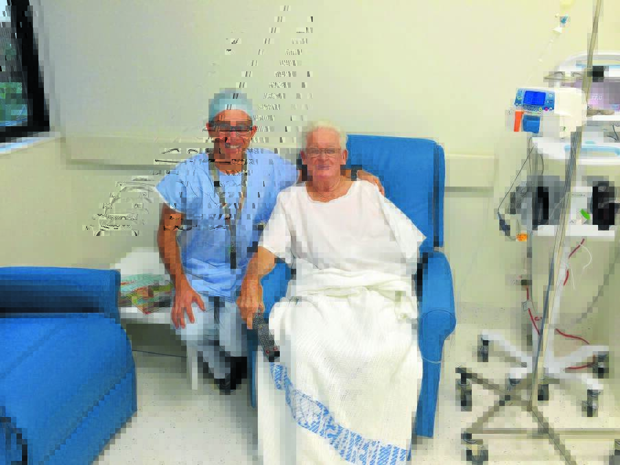 Cardiac care closer to home: cardiologist and Port Macquarie Base Hospital cardiac catheterisation laboratory director Dr Kristian Prados with the facility's first patient, Robert Kennedy.