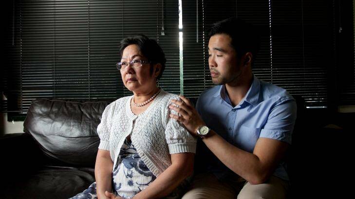 Hong Vo, mother of 22-year-old former Melbourne High student Martin Vo who took his own life last year, with her older son Daniel. Photo: Arsineh Houspian
