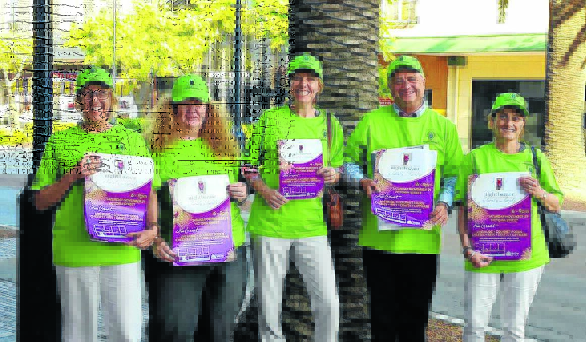 Taree's Night Bazaar committee get ready for the event. From left, Catherine Calvin, Annette O'Rourke, Liz Rankin, James Paton and Maree Cheney.