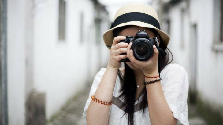 When travelling, it's good to remember that there are some things you can't take photos of. Photo: iStock