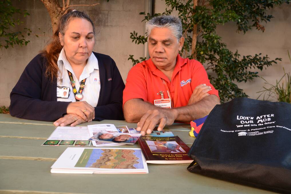 New Aboriginal Health cancer support worker Michelle Wilkes and Anthony Avery remember Anthony 'Anno' Avery junior, who died from bowel cancer in 2008 at the age of 26. They encourage members of the Aboriginal community to attend the cancer forum in Purfleet on Tuesday to meet and hear from the Manning Hospital clinical team. They also want to send the message to get checked if you are experiencing any symptoms.