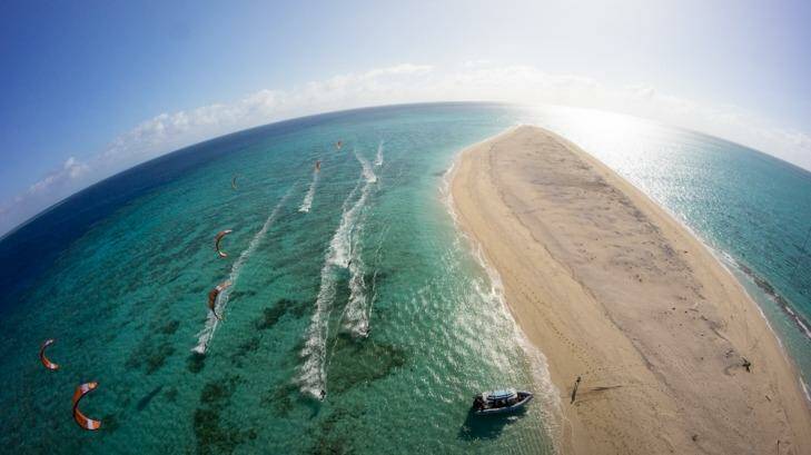 Seven kite surfers are about to break a world record with a 1000-kilometre expedition on the Great Barrier Reef. Photo: John Biderback