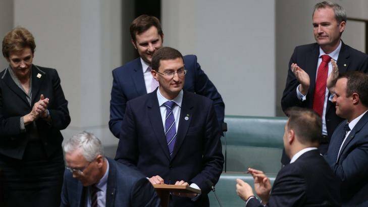Mr Leeser is congratulated by other MPs after delivering his first speech. Photo: Andrew Meares