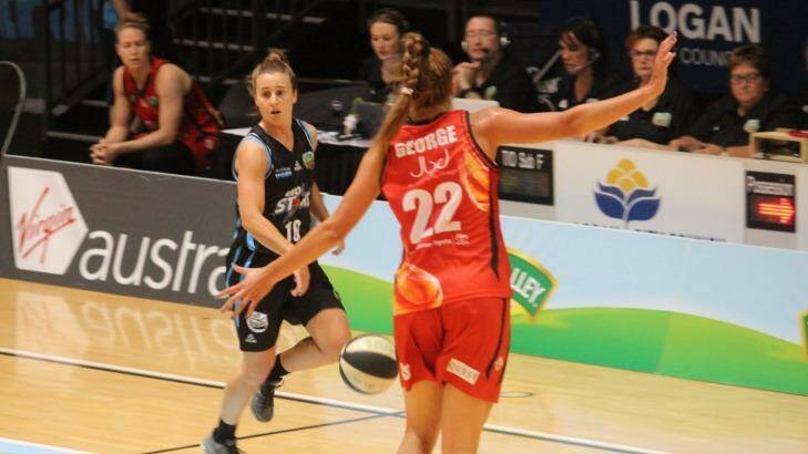 SEQ Stars' point guard Lauren Mansfield brings the ball up against Townsville, on her way to 17 points, seven rebounds and eight assists on her birthday. Photo: Supplied