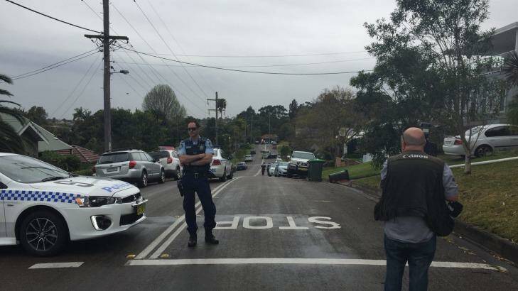 Police on the scene at Mountain Avenue in Woonona. Photo: Kate McIlwain