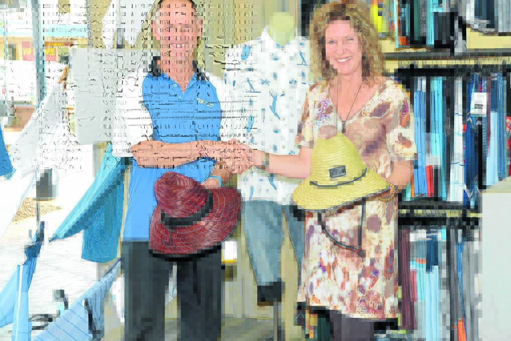 This week's sportstar winner Gary Newman and Vanessa Gibson from award sponsor Iguana..