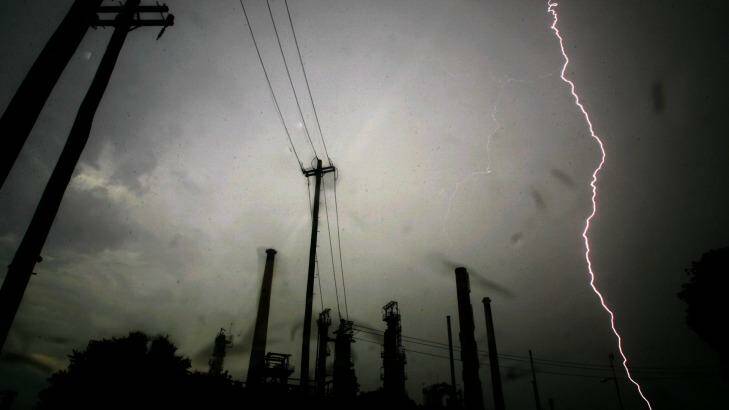Lightning strikes near the Caltex refinery in Silverwater, in Sydney's west. Photo: Nick Moir