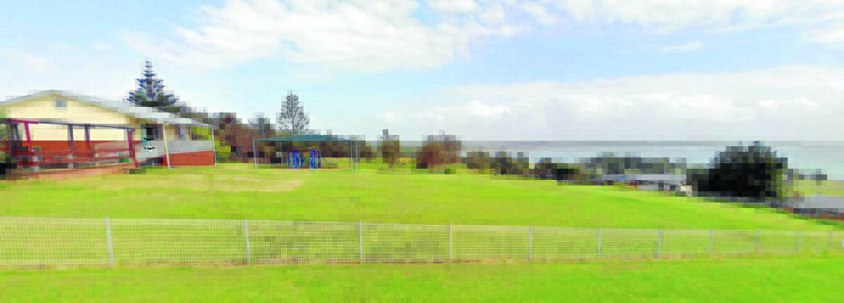 Crowdy Head Public School is located on land that enjoys expansive views of Crowdy Back Beach and Crowdy Bay. Photo Google Earth.
