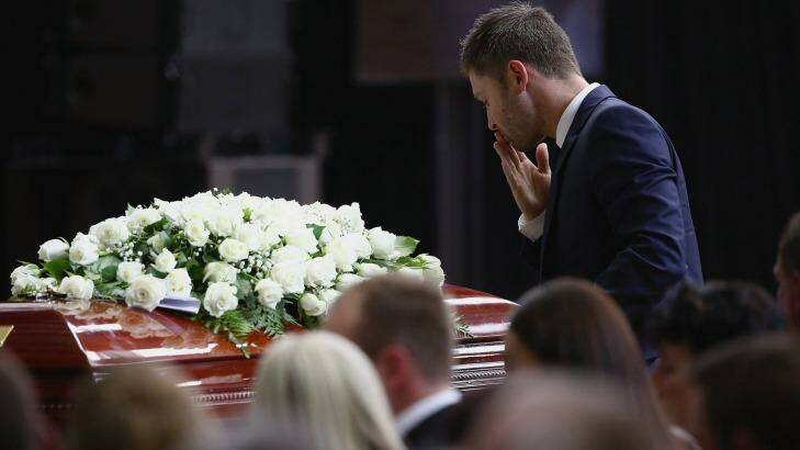 Funeral: Michael Clarke pays his respects.