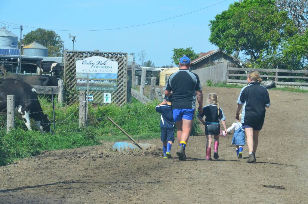 Future farming generation: Lachlan, Murray. Ruby, Isabella and Jane Polson walk inside Oxley Vale Holstein.