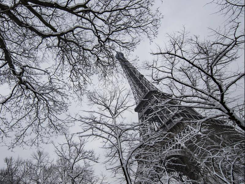 The Eiffel Tower is closed as snow and freezing rain hit parts of France unprepared for the weather.